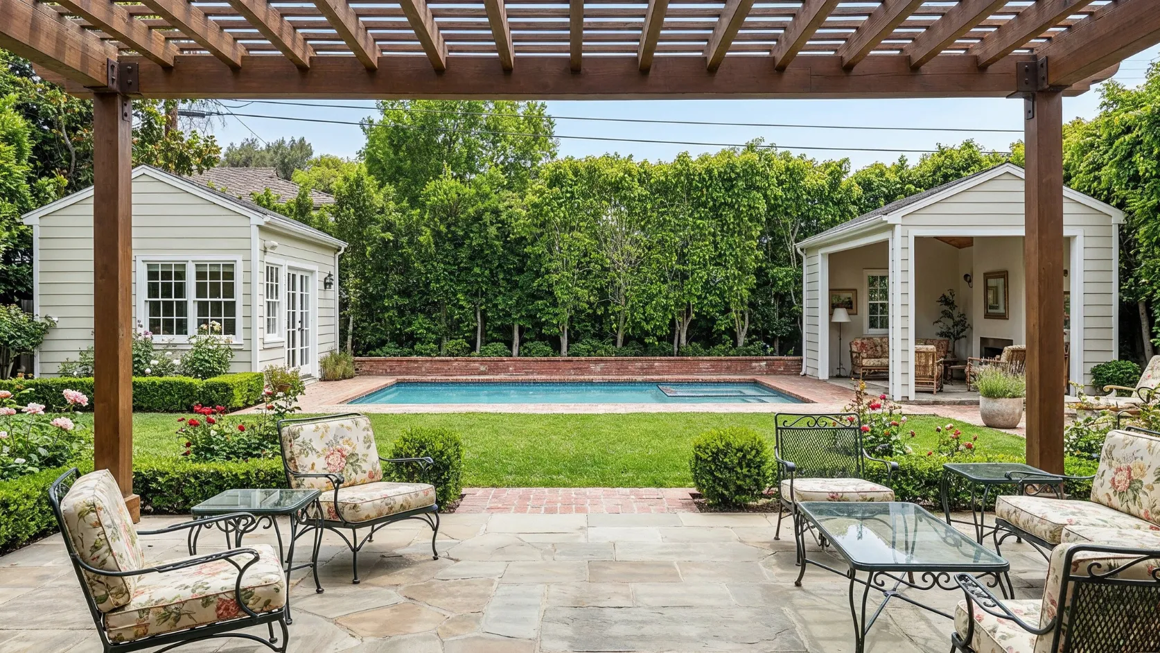 Before outdoor living remodeling project in Los Angeles with traditional patio seating, older pool area, dated outdoor finishes, and limited modern entertainment flow