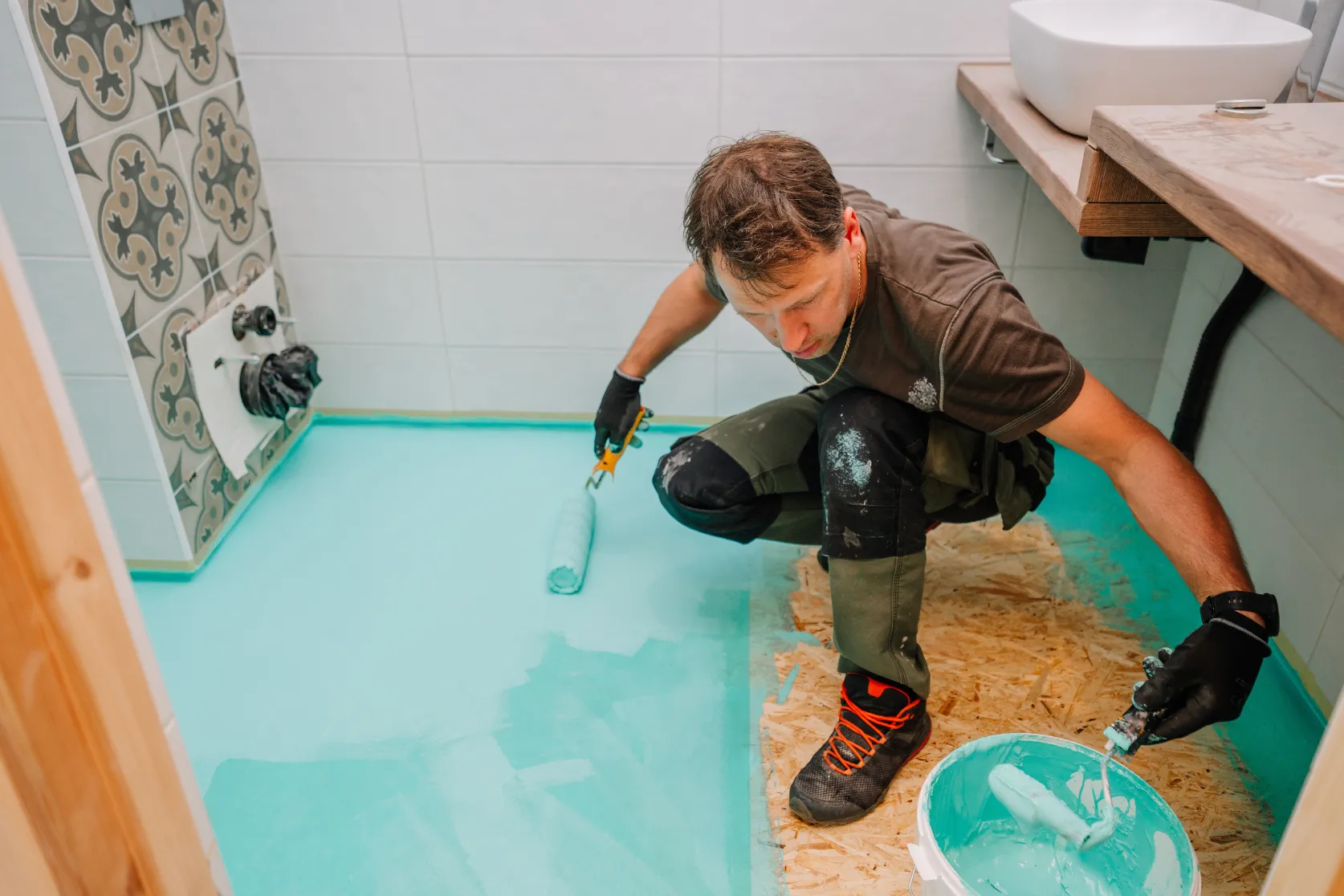 Bathroom remodeling in Los Angeles with waterproofing floor preparation before tile, shower, vanity, and finish installation