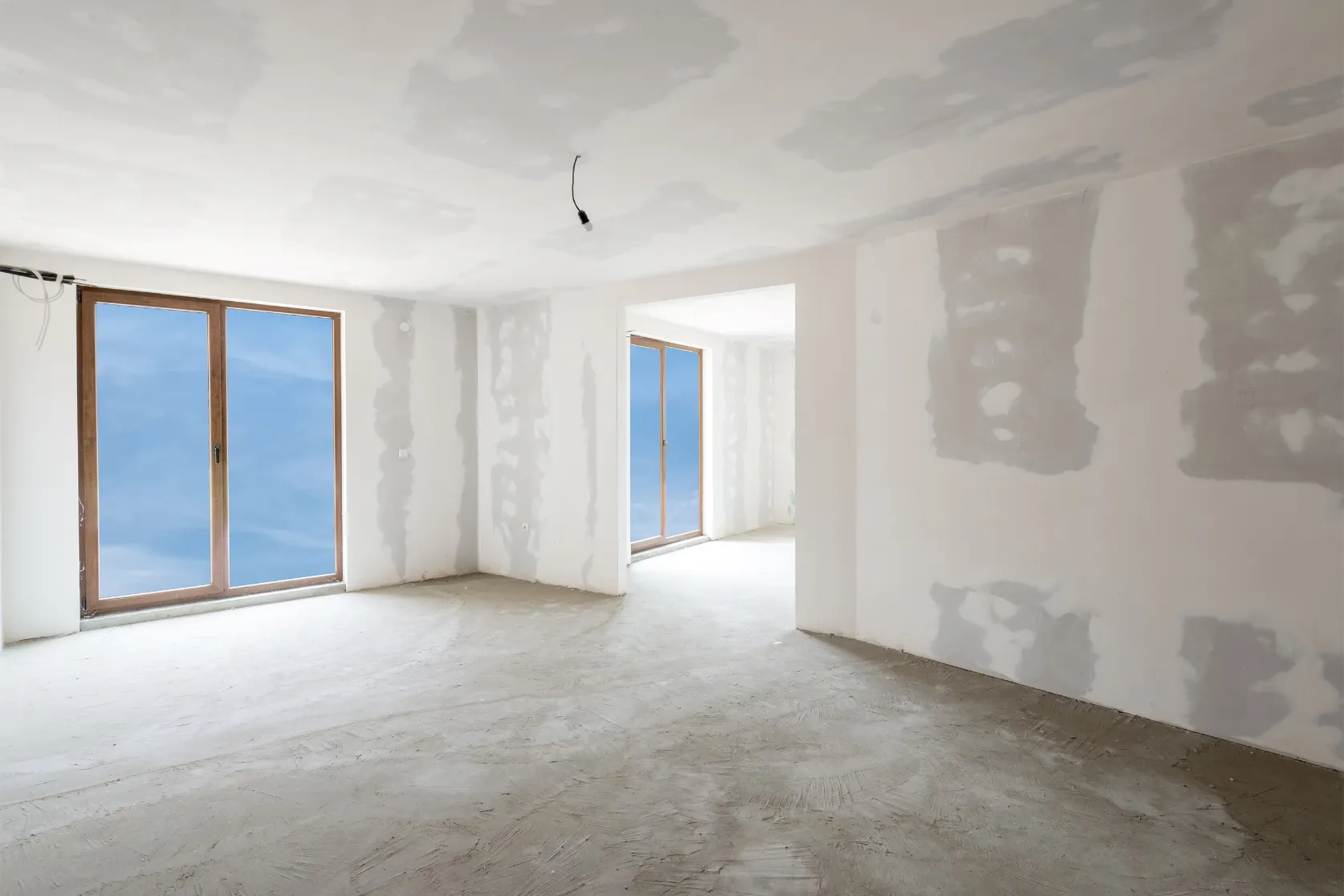 Commercial remodeling in Los Angeles with drywall finishing, open interior renovation, wall preparation, and business space improvement work