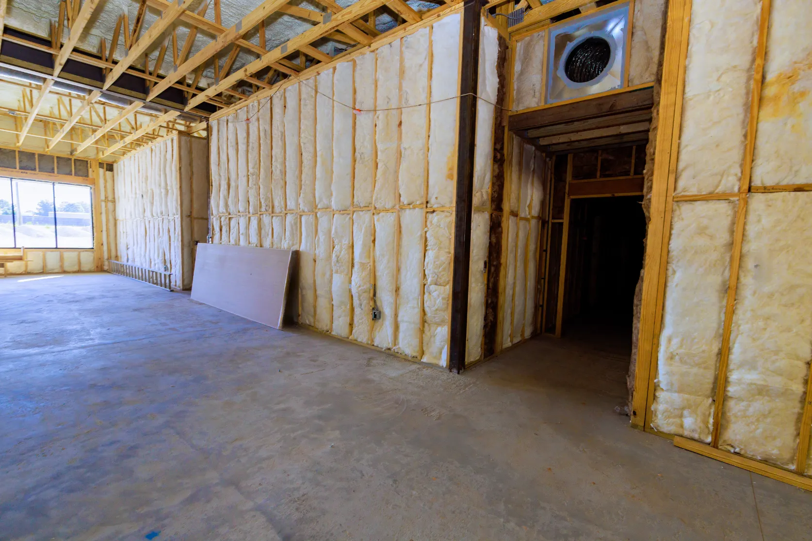 Commercial remodeling in Los Angeles with interior framing, wall insulation, ceiling structure, and buildout preparation for a business space