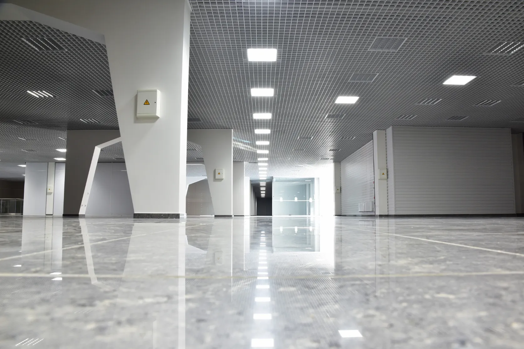 Completed commercial remodeling project in Los Angeles with modern retail or office interior, polished flooring, bright lighting, and clean open space
