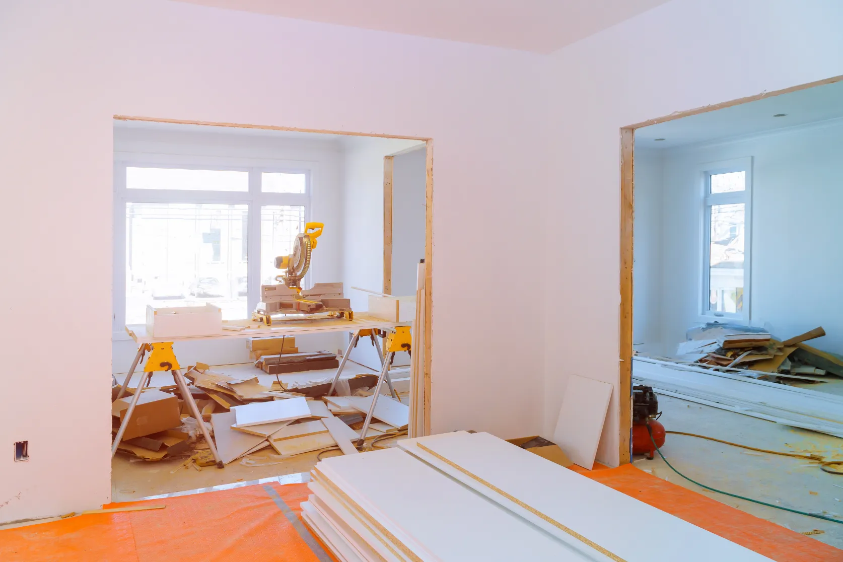 Full home remodeling in Los Angeles with interior construction work, open room preparation, trim updates, and renovation materials