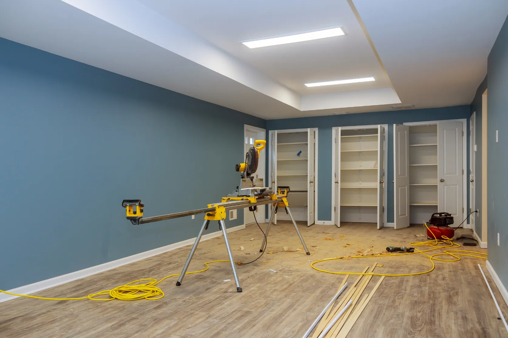 Interior remodeling in Los Angeles with room flooring installation, recessed lighting, closet updates, wall finishes, and trim work
