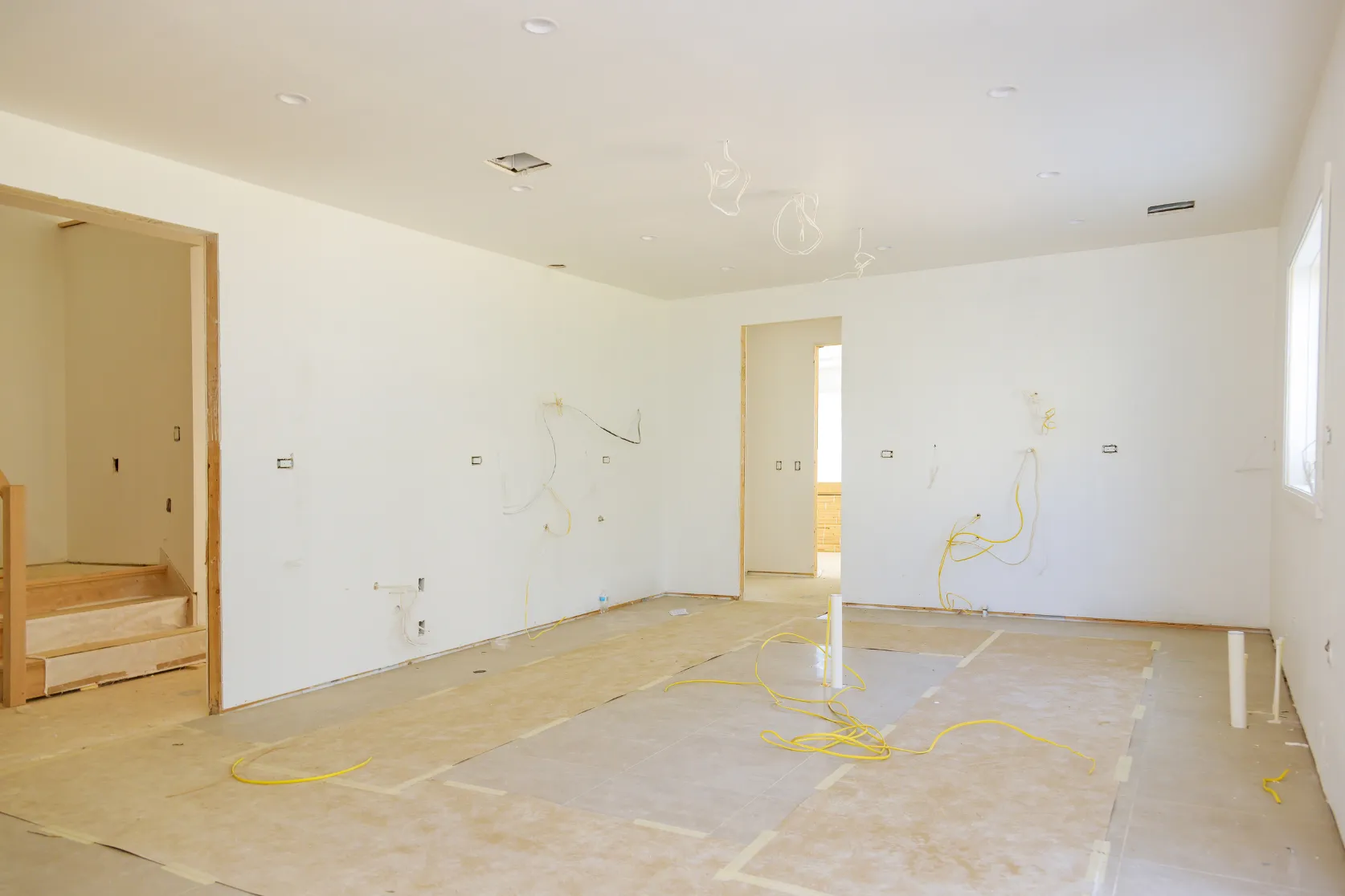 Luxury home remodeling in Los Angeles with open room renovation, electrical rough-in, recessed lighting layout, wall preparation, and premium interior planning