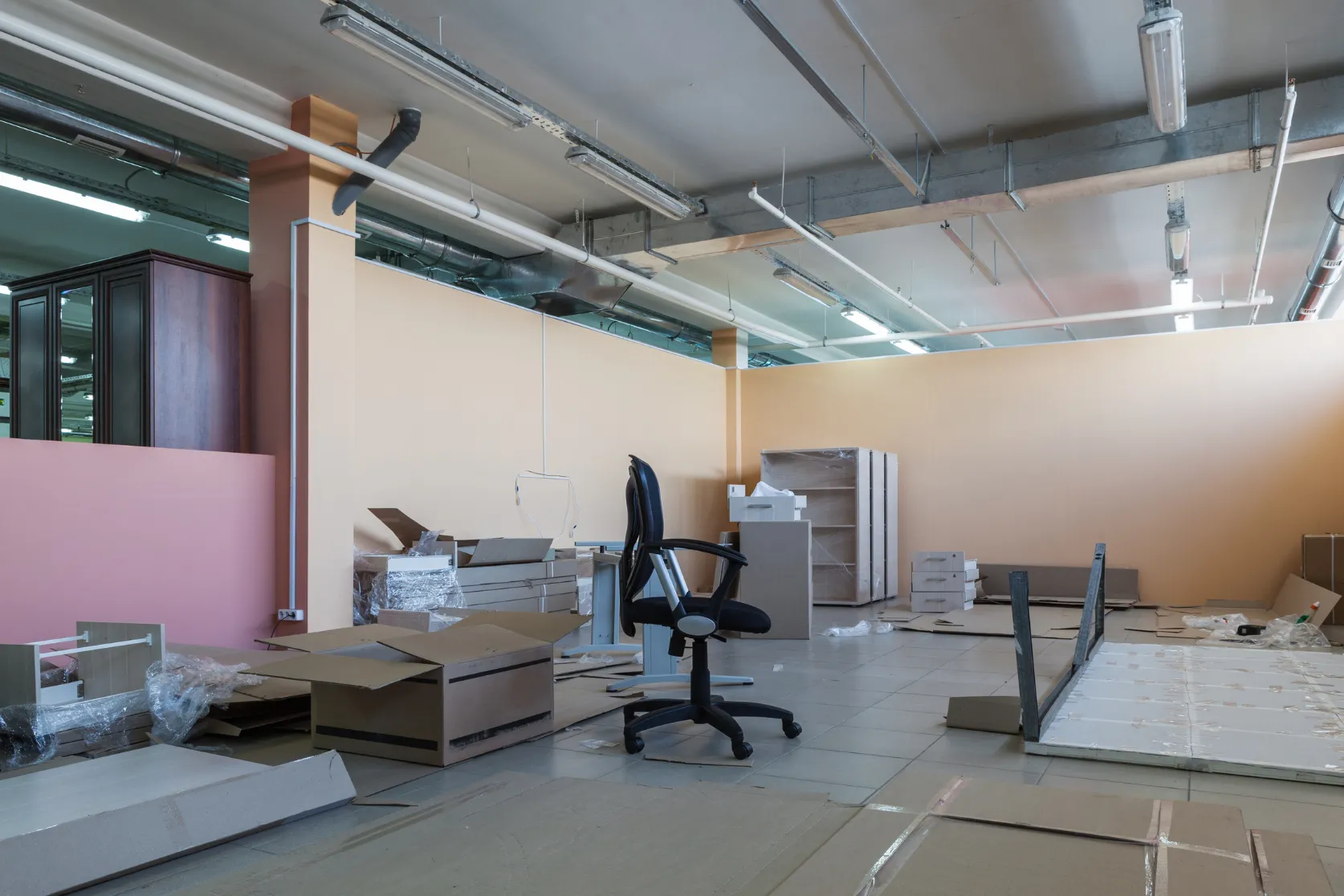 Office remodeling in Los Angeles with cubicle workspace renovation, ceiling tile updates, lighting work, and commercial interior improvements